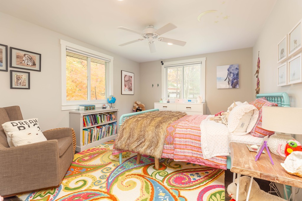 140 Whiting Street Hingham, MA 02043 - Photo 14 of 25 a bedroom with a bed and a couch