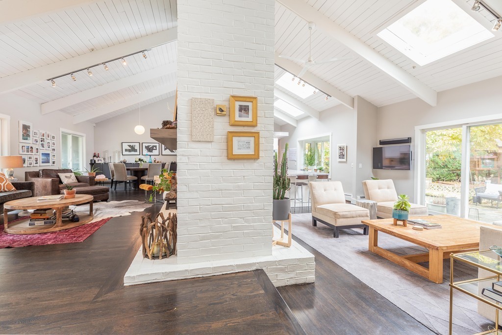 140 Whiting Street Hingham, MA 02043 - Photo 4 of 25 a living room with furniture kitchen view and large window