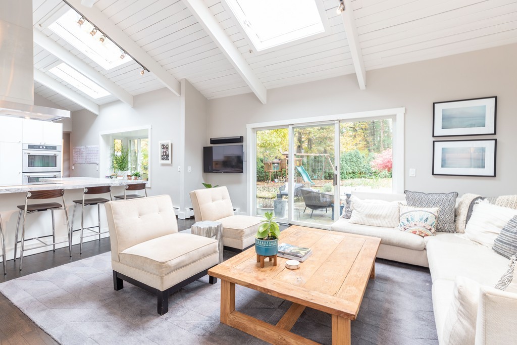 140 Whiting Street Hingham, MA 02043 - Photo 5 of 25 a living room with furniture and a large window