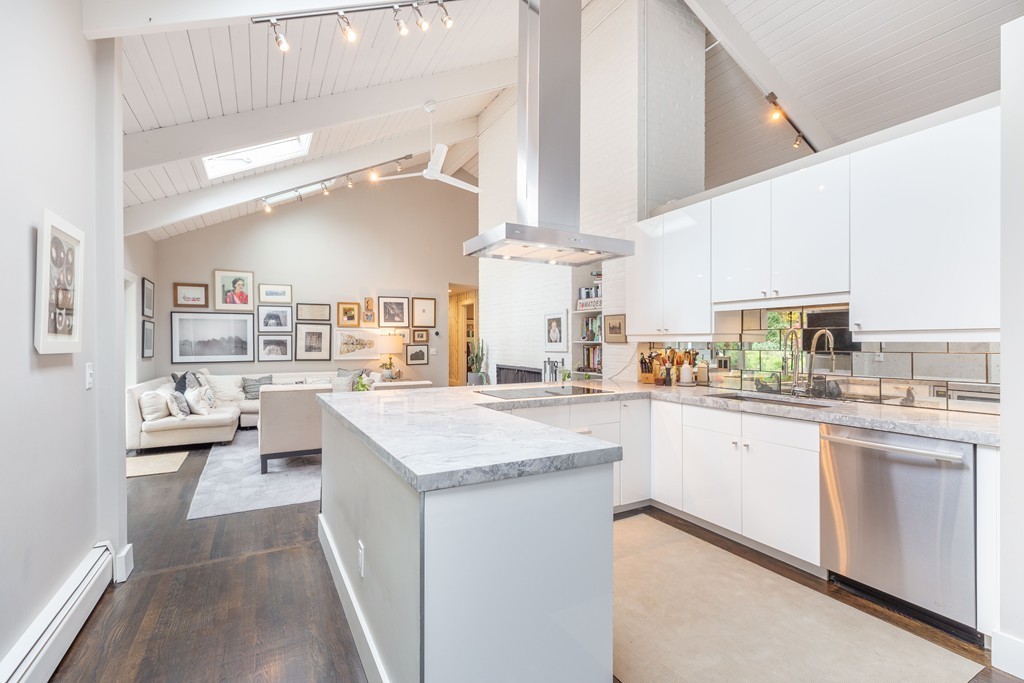 140 Whiting Street Hingham, MA 02043 - Photo 9 of 25 a kitchen with counter top space and cabinets