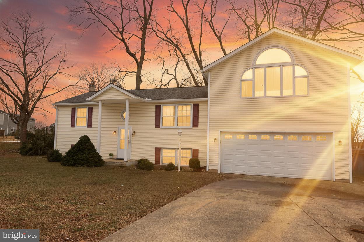 105 West Village Road Elkton, MD 21921 - Photo 1 of 32 a front view of a house with a yard
