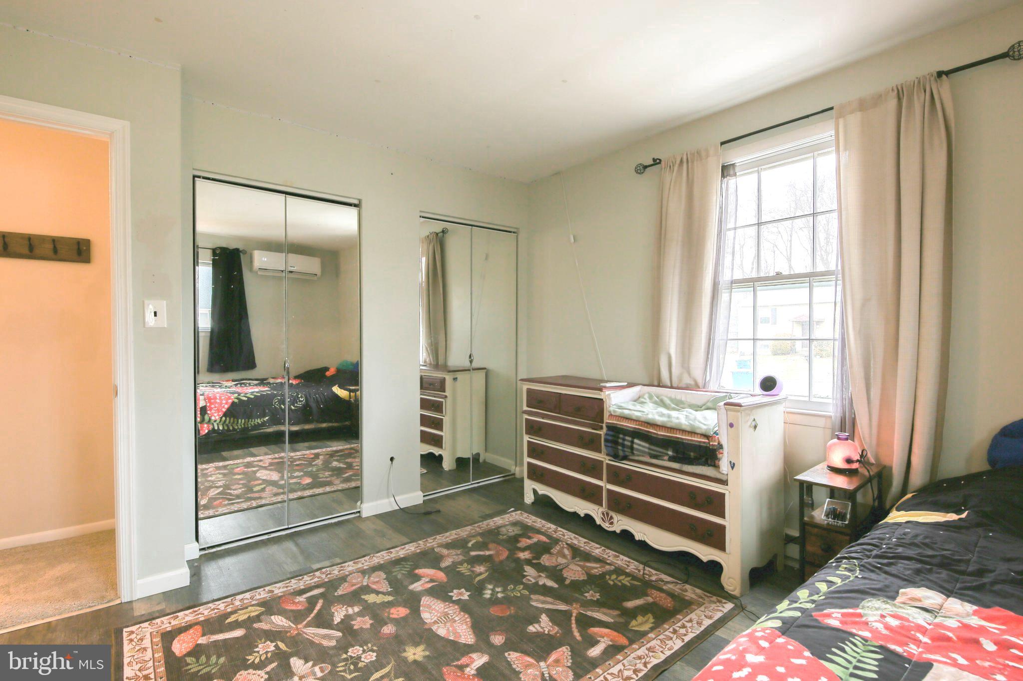 105 West Village Road Elkton, MD 21921 - Photo 13 of 32 a room that has a bed and a window in it