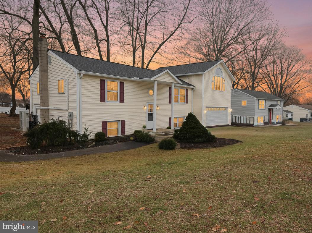 105 West Village Road Elkton, MD 21921 - Photo 2 of 32 a view of a house with backyard
