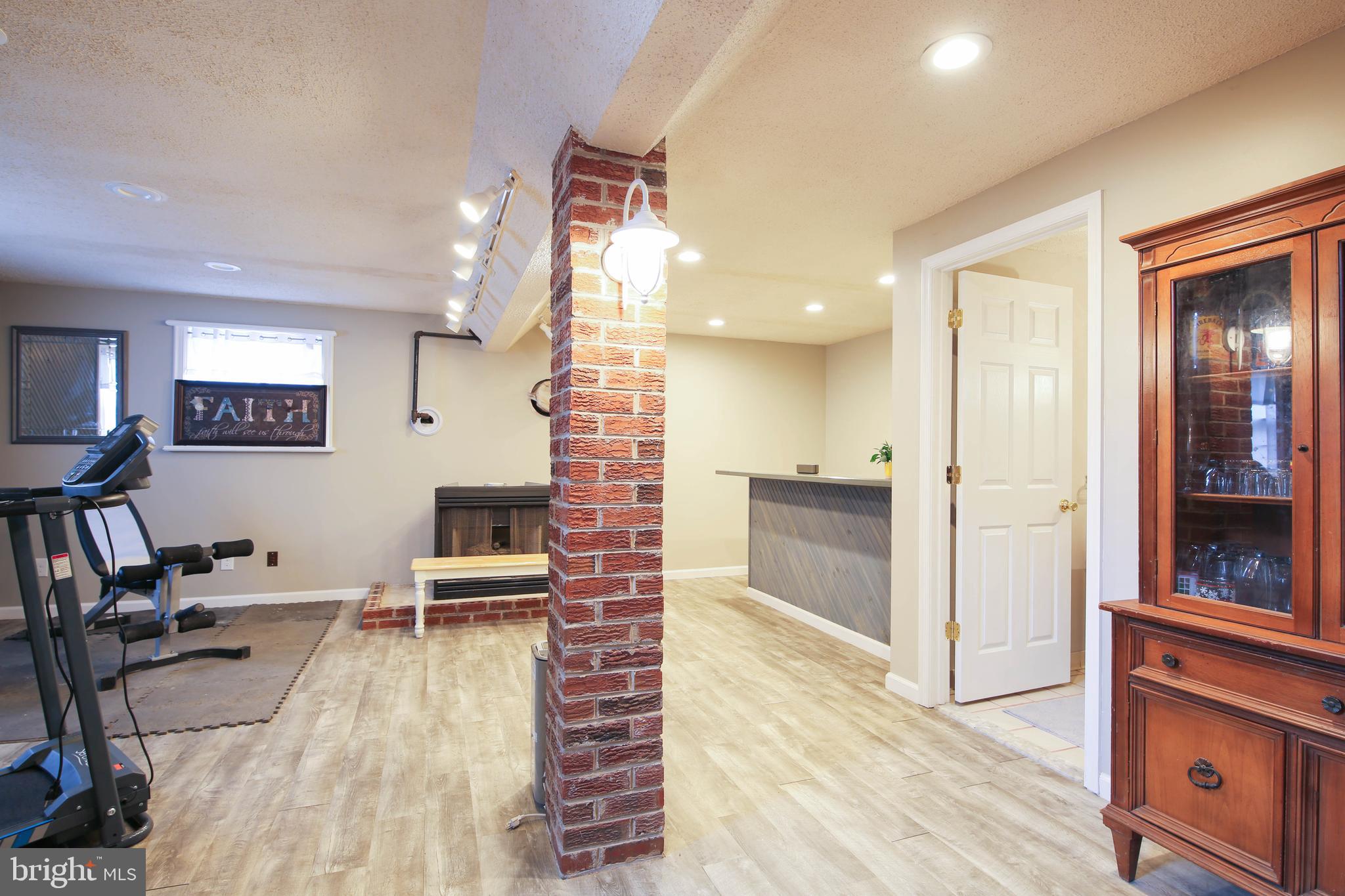 105 West Village Road Elkton, MD 21921 - Photo 22 of 32 a living room with furniture and a wooden floor