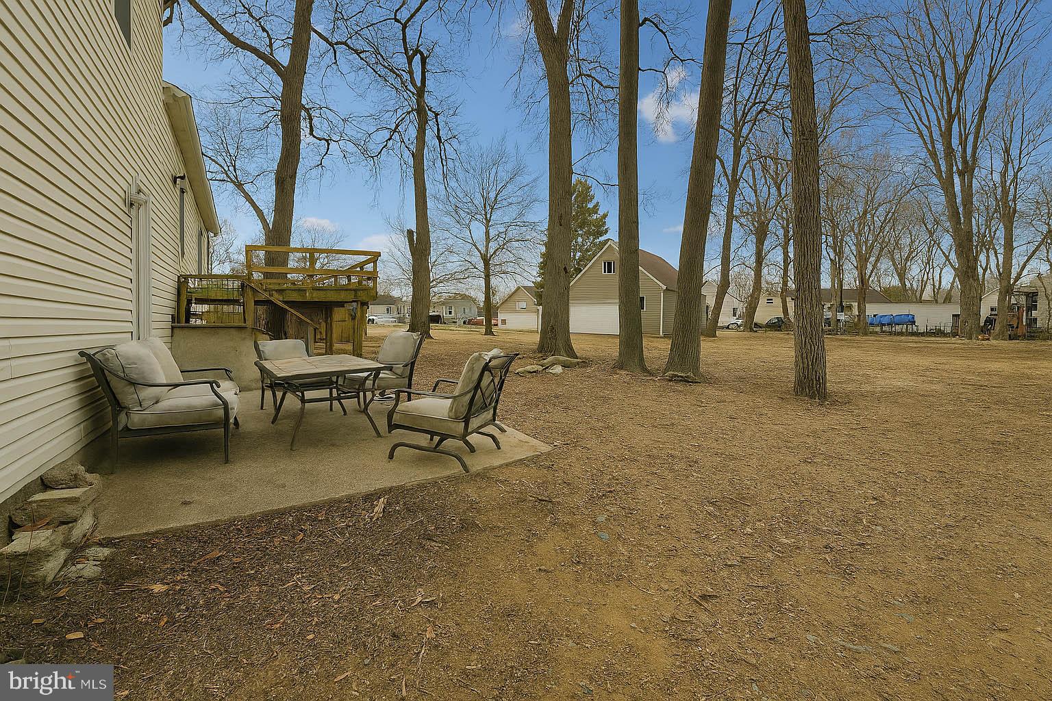 105 West Village Road Elkton, MD 21921 - Photo 32 of 32 a view of a backyard with chairs