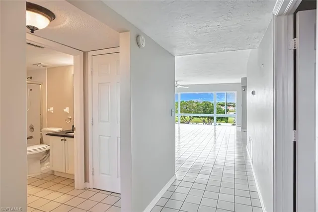 a bathroom with a shower and a toilet