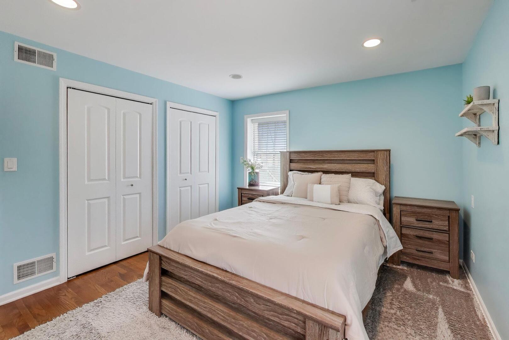 1127 Timber Trails Road Downers Grove, IL 60516 - Photo 13 of 30 a bedroom with a bed and a cabinets