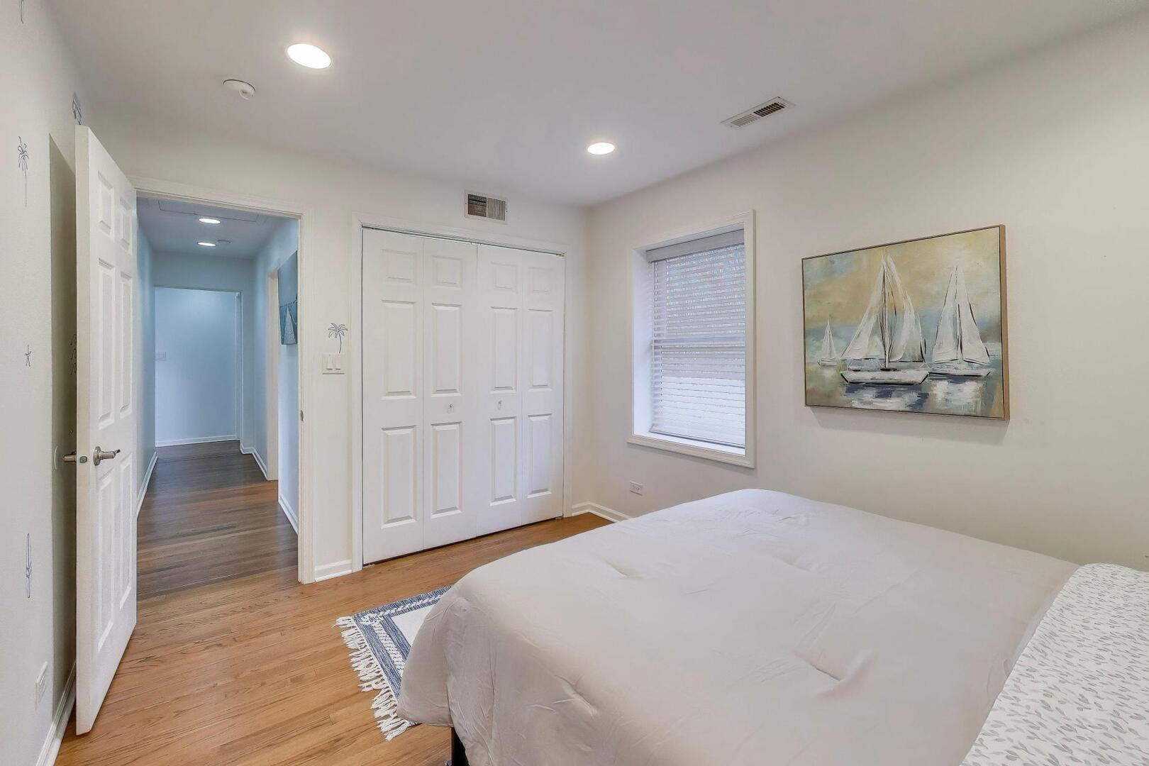 1127 Timber Trails Road Downers Grove, IL 60516 - Photo 16 of 30 a bedroom with a bed and wooden floor