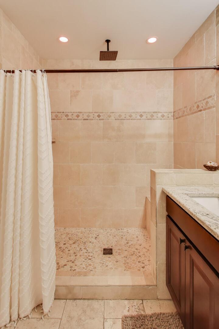1127 Timber Trails Road Downers Grove, IL 60516 - Photo 18 of 30 a bathroom with a granite countertop shower and a sink
