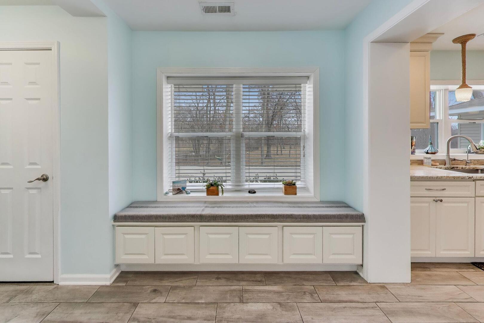 1127 Timber Trails Road Downers Grove, IL 60516 - Photo 20 of 30 a car parked in front of a window