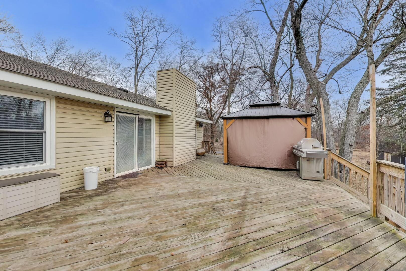 1127 Timber Trails Road Downers Grove, IL 60516 - Photo 25 of 30 a view of a house with a wooden fence