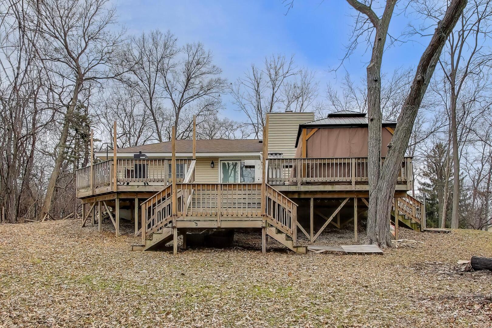 1127 Timber Trails Road Downers Grove, IL 60516 - Photo 26 of 30 a view of a house with backyard and sitting area
