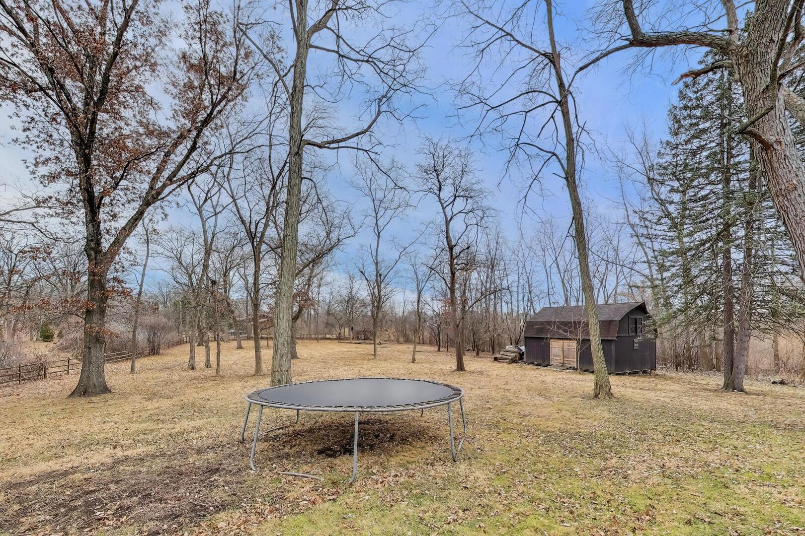 1127 Timber Trails Road Downers Grove, IL 60516 - Photo 27 of 30 a view of a yard with a tree