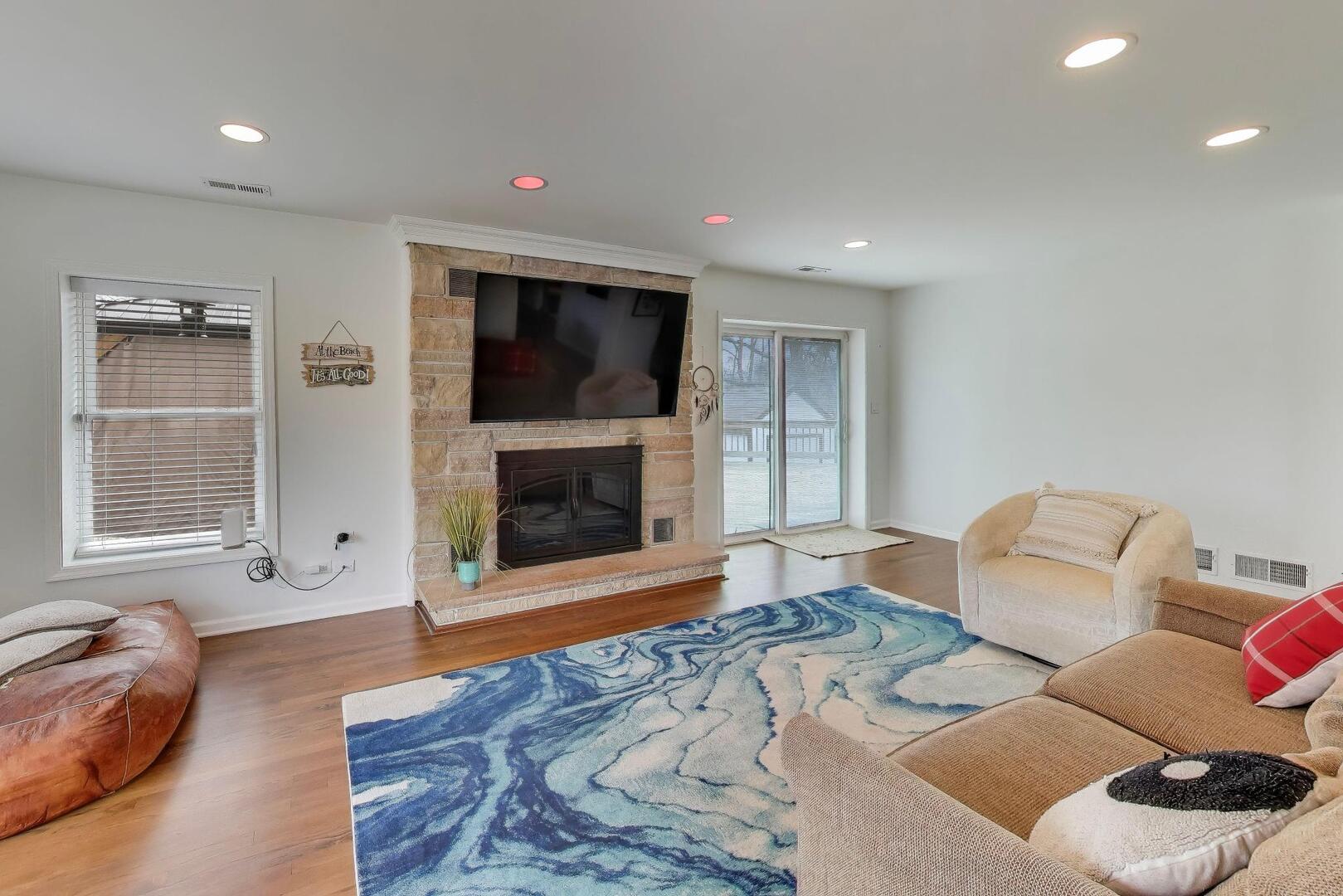 1127 Timber Trails Road Downers Grove, IL 60516 - Photo 5 of 30 a living room with furniture and a fireplace