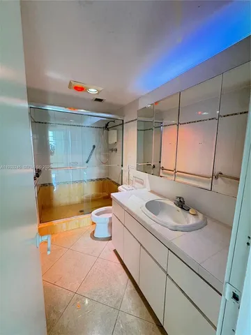 an empty room with a empty space and windows