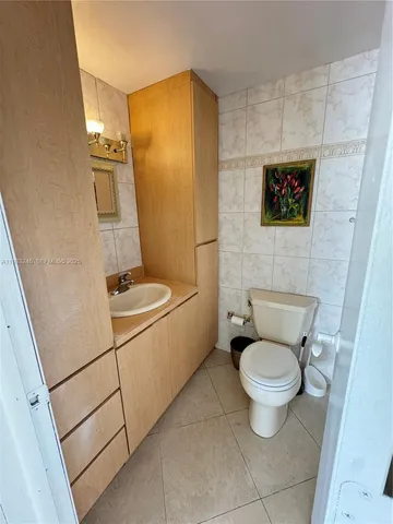 a front view of a building with a street