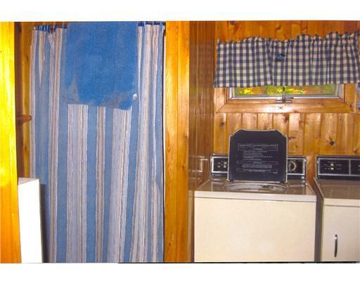 248 West Shore (side) Road Stacyville, ME 04777 - Photo 8 of 12 Bathroom. 3/4 bath with washer and...