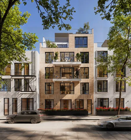 a view of a street with a building in the background