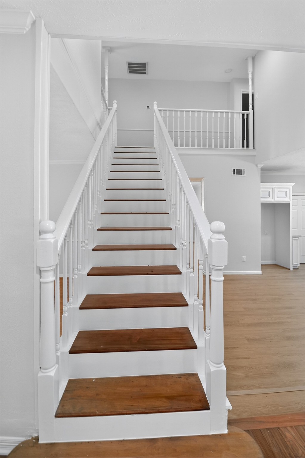 406 Hohldale Street Houston, TX 77091 - Photo 26 of 39 Vaulted ceilings leading upstairs