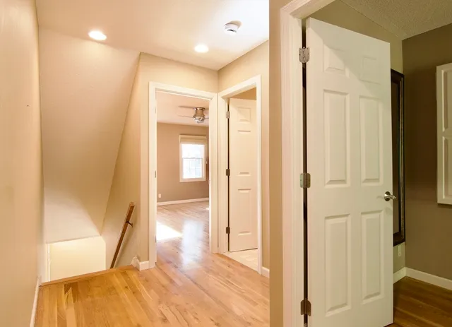 a view of an empty room and window