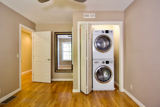 a view of a storage & utility room with a washer dryer