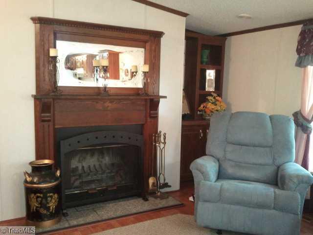 Den/Family/Great Room. Den with wood fireplace with blower is a great way to cut heating costs.