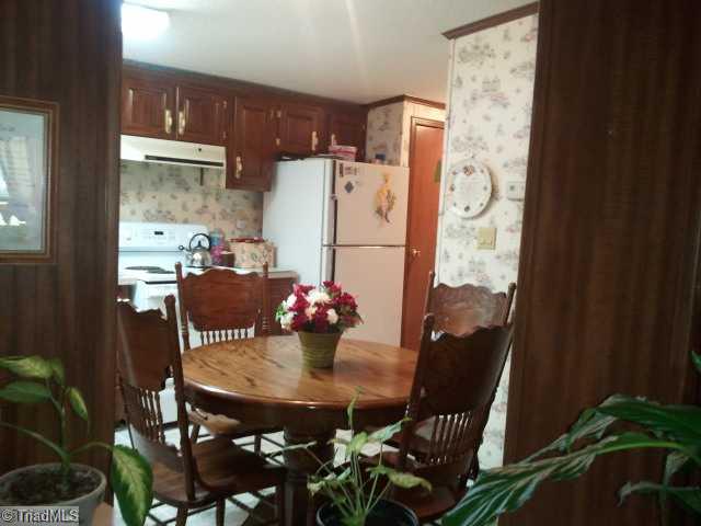 Kitchen. Kitchen with built in shelves and lots of cabinet space and a pantry.