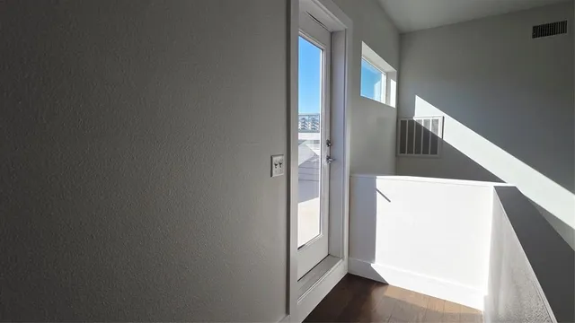 a view of a hallway with entryway