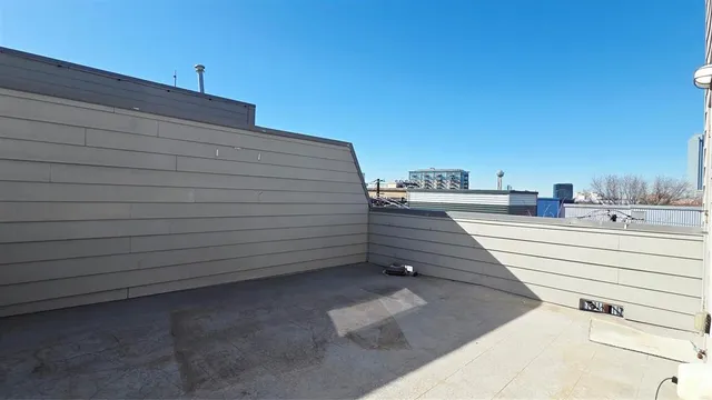 a view of a terrace with sky view