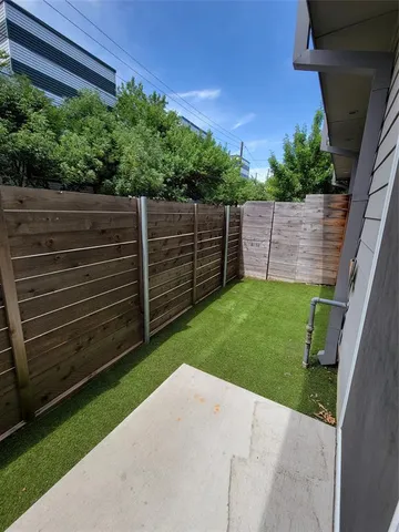 a view of a backyard with a garden