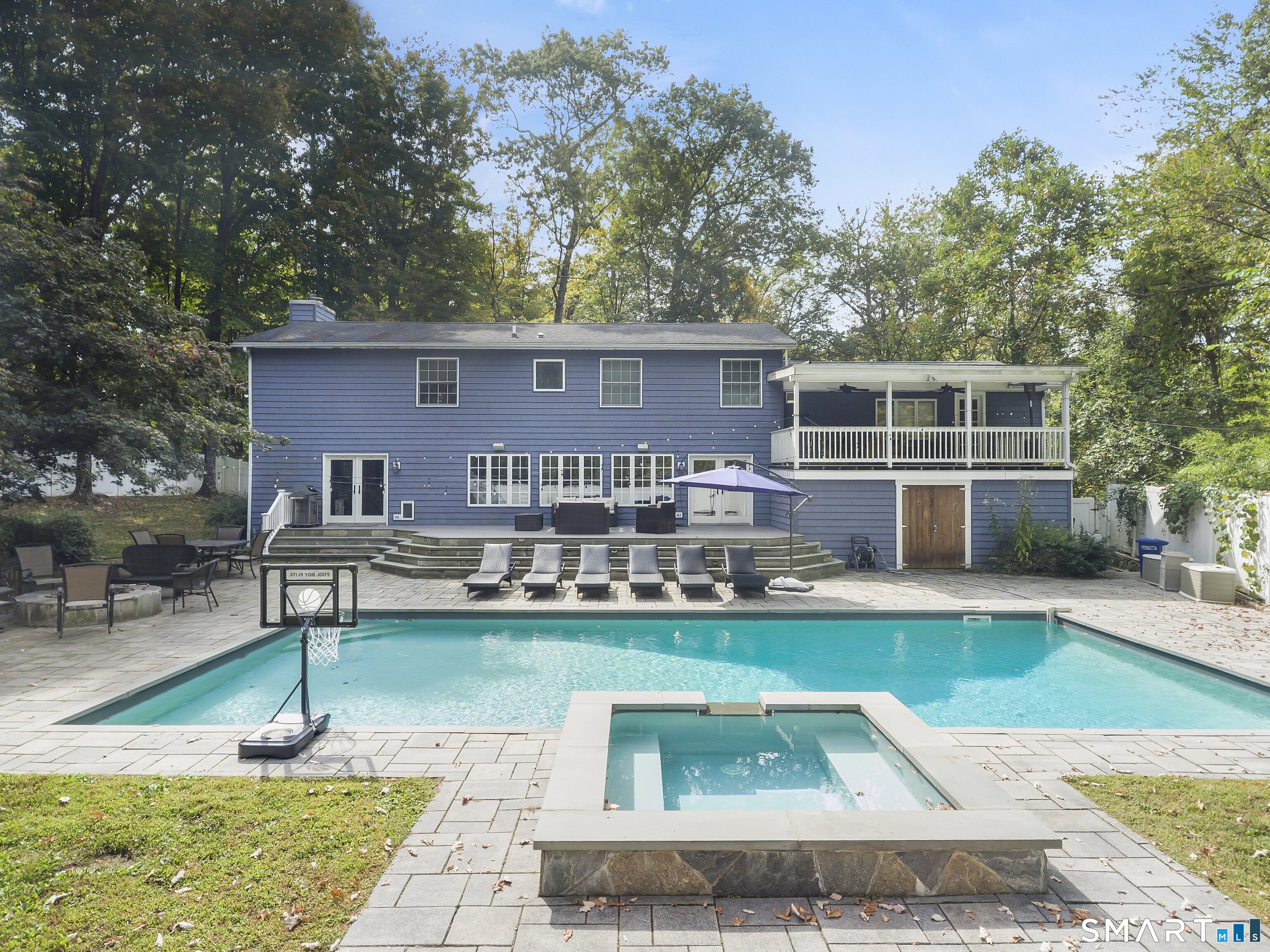 205 Weston Road Weston, CT 06883 - Photo 19 of 21 a front view of a house with garden