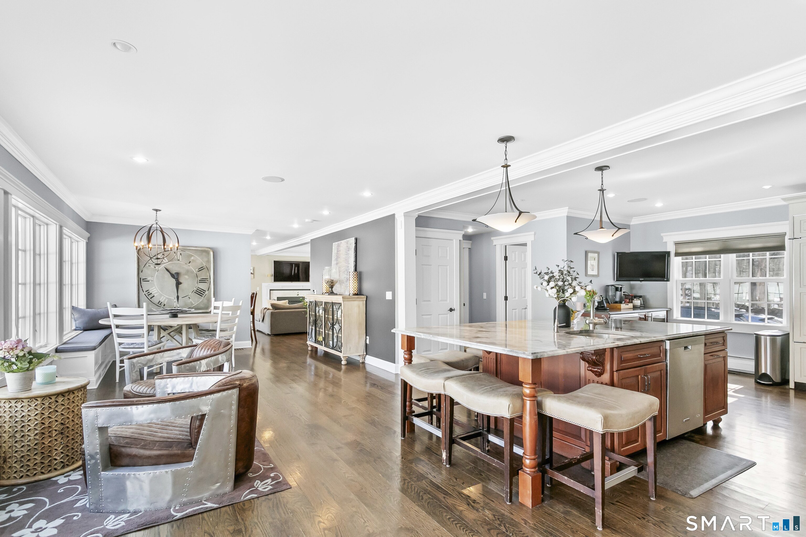 205 Weston Road Weston, CT 06883 - Photo 6 of 21 a living room with stainless steel appliances kitchen island granite countertop furniture and a kitchen view