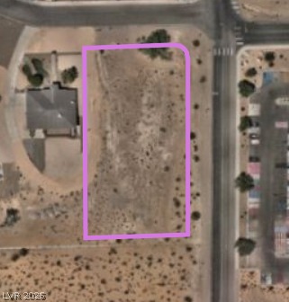 A spacious, undeveloped lot with ample room for future construction opportunities.