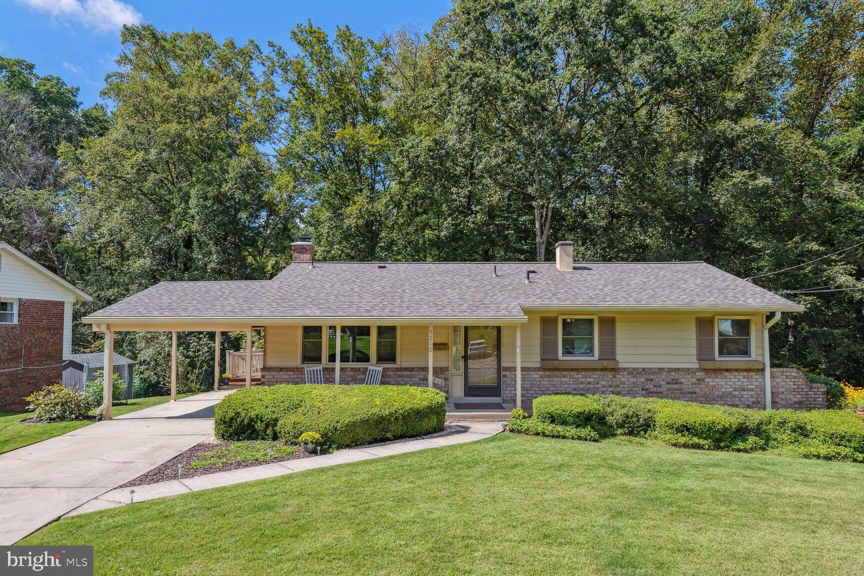 a view of a yard in front of a house
