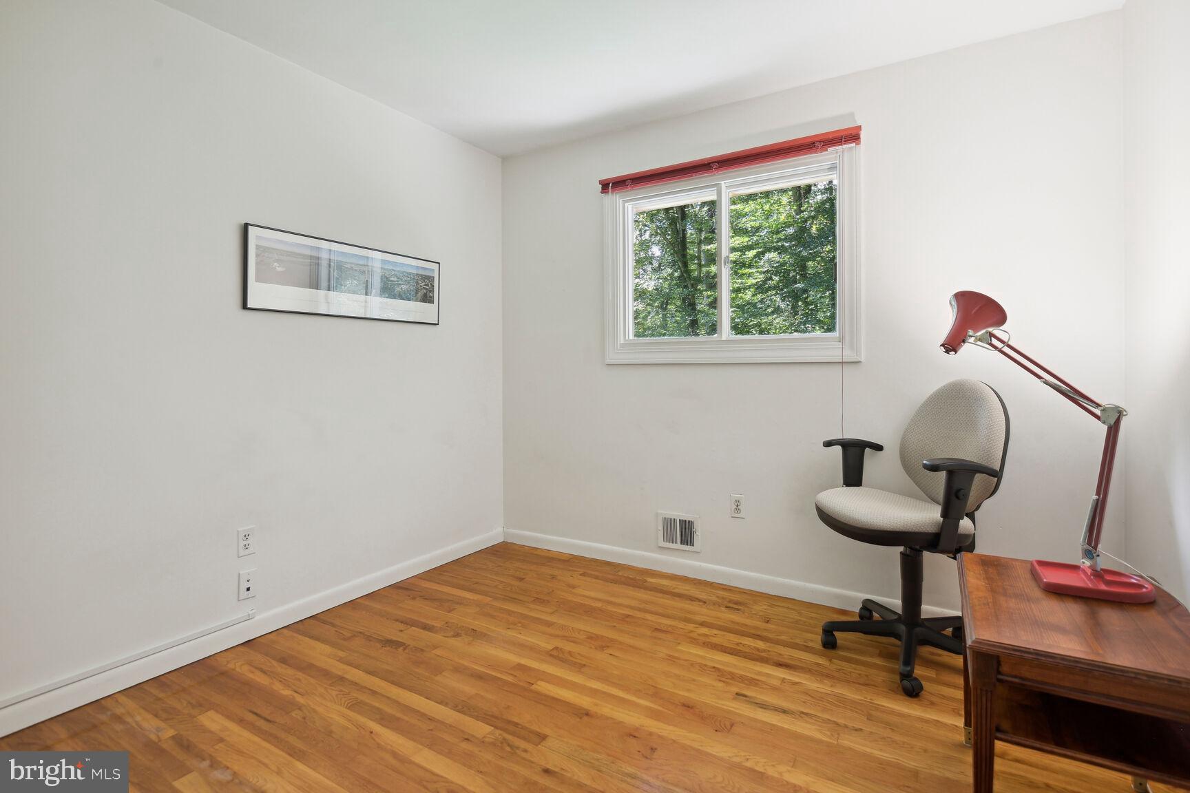 5210 Russett Road Rockville, MD 20853 - Photo 13 of 28 a view of a workspace with furniture and a window