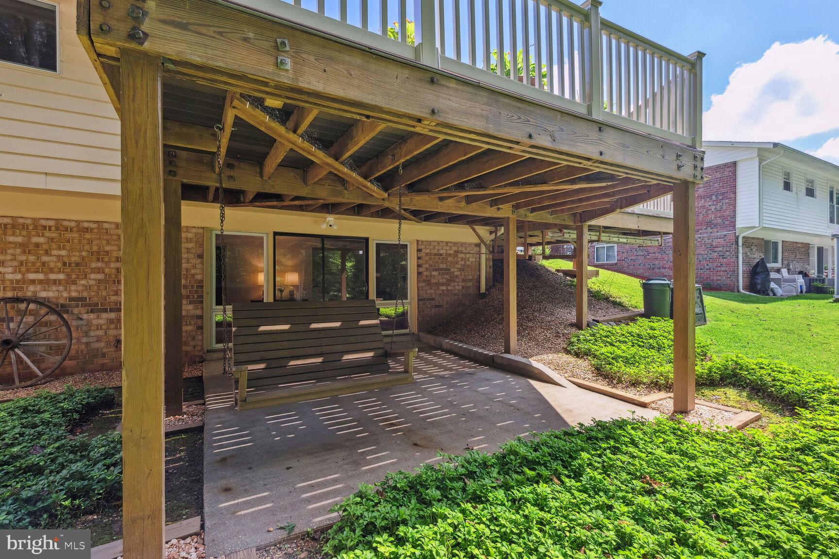 5210 Russett Road Rockville, MD 20853 - Photo 23 of 28 a view of a house with backyard and porch