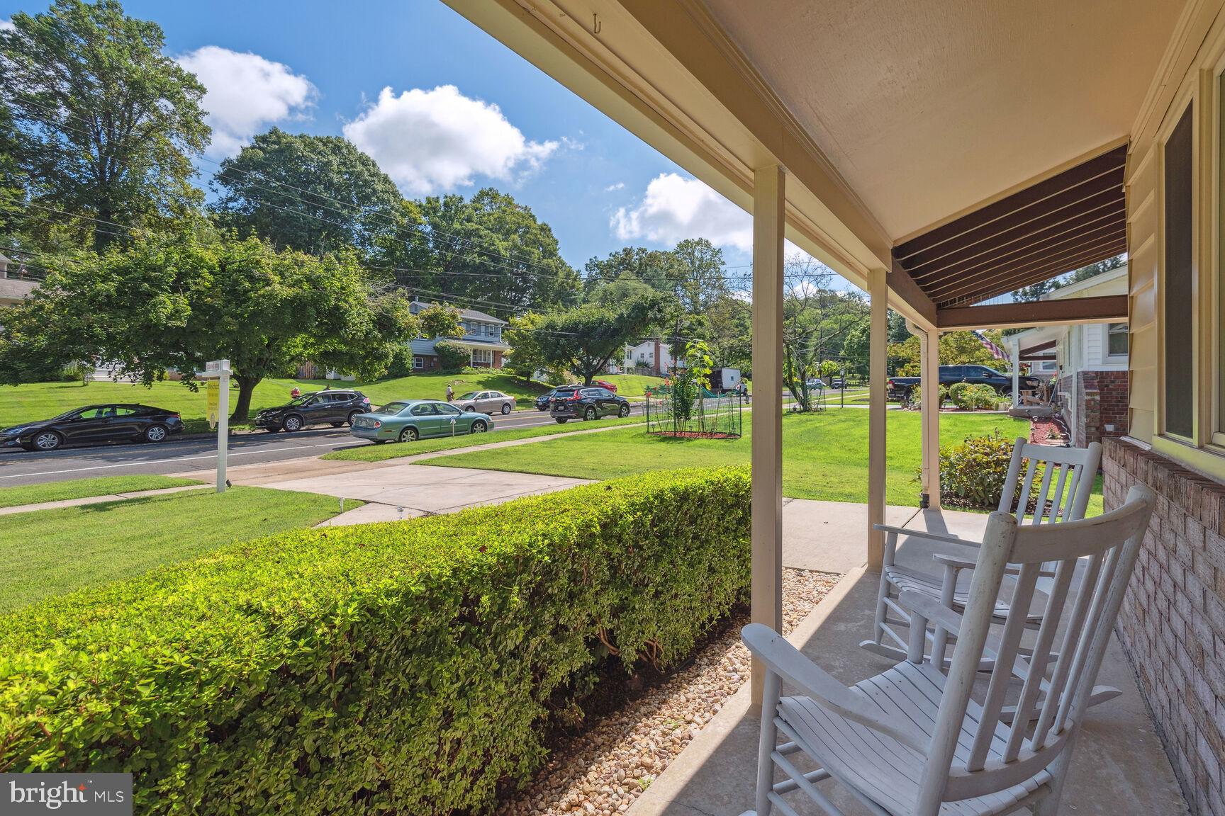 5210 Russett Road Rockville, MD 20853 - Photo 3 of 28 a view of a porch with furniture and garden