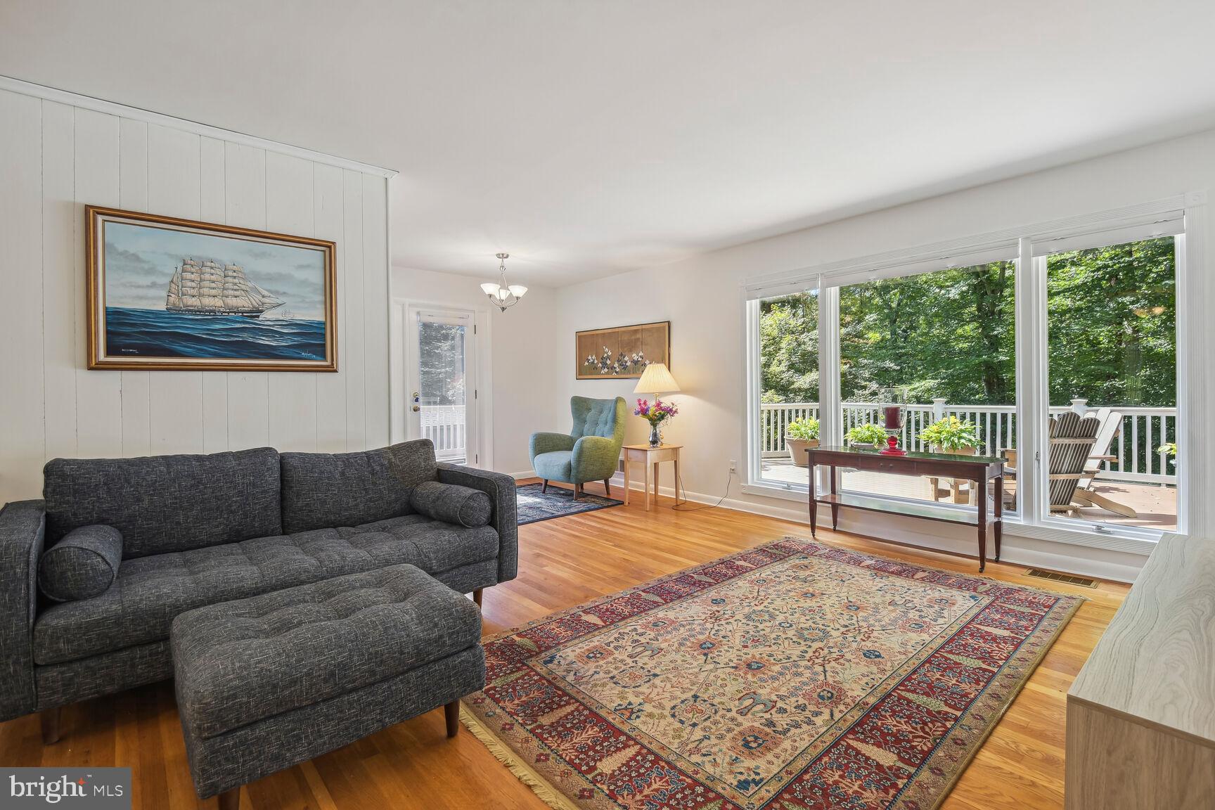 5210 Russett Road Rockville, MD 20853 - Photo 4 of 28 a living room with furniture and a rug