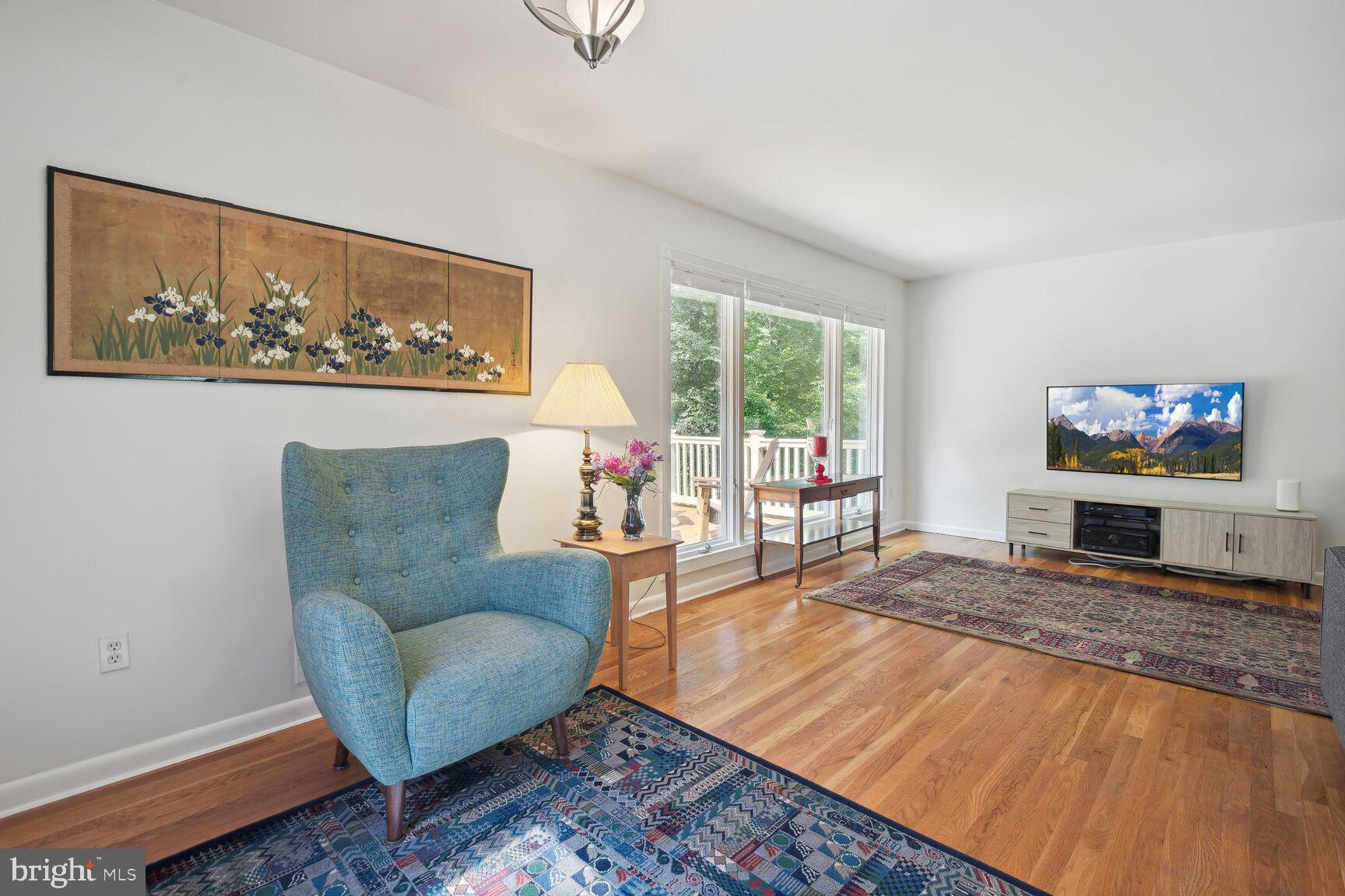 5210 Russett Road Rockville, MD 20853 - Photo 7 of 28 a living room with furniture and a flat screen tv