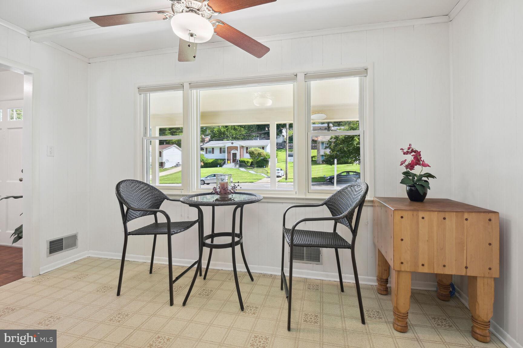 5210 Russett Road Rockville, MD 20853 - Photo 8 of 28 a view of a dining room with furniture window and outside view