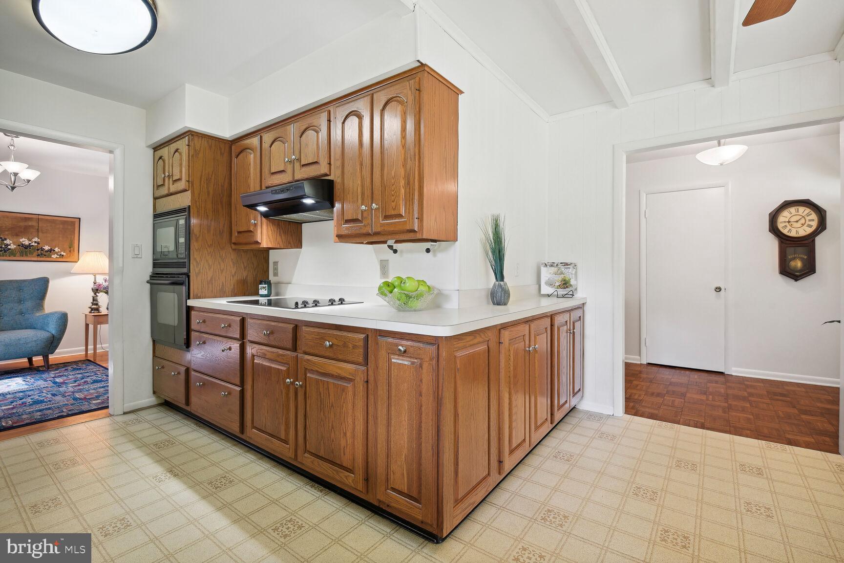 5210 Russett Road Rockville, MD 20853 - Photo 10 of 28 a spacious bathroom with stainless steel appliances a sink and a cabinets