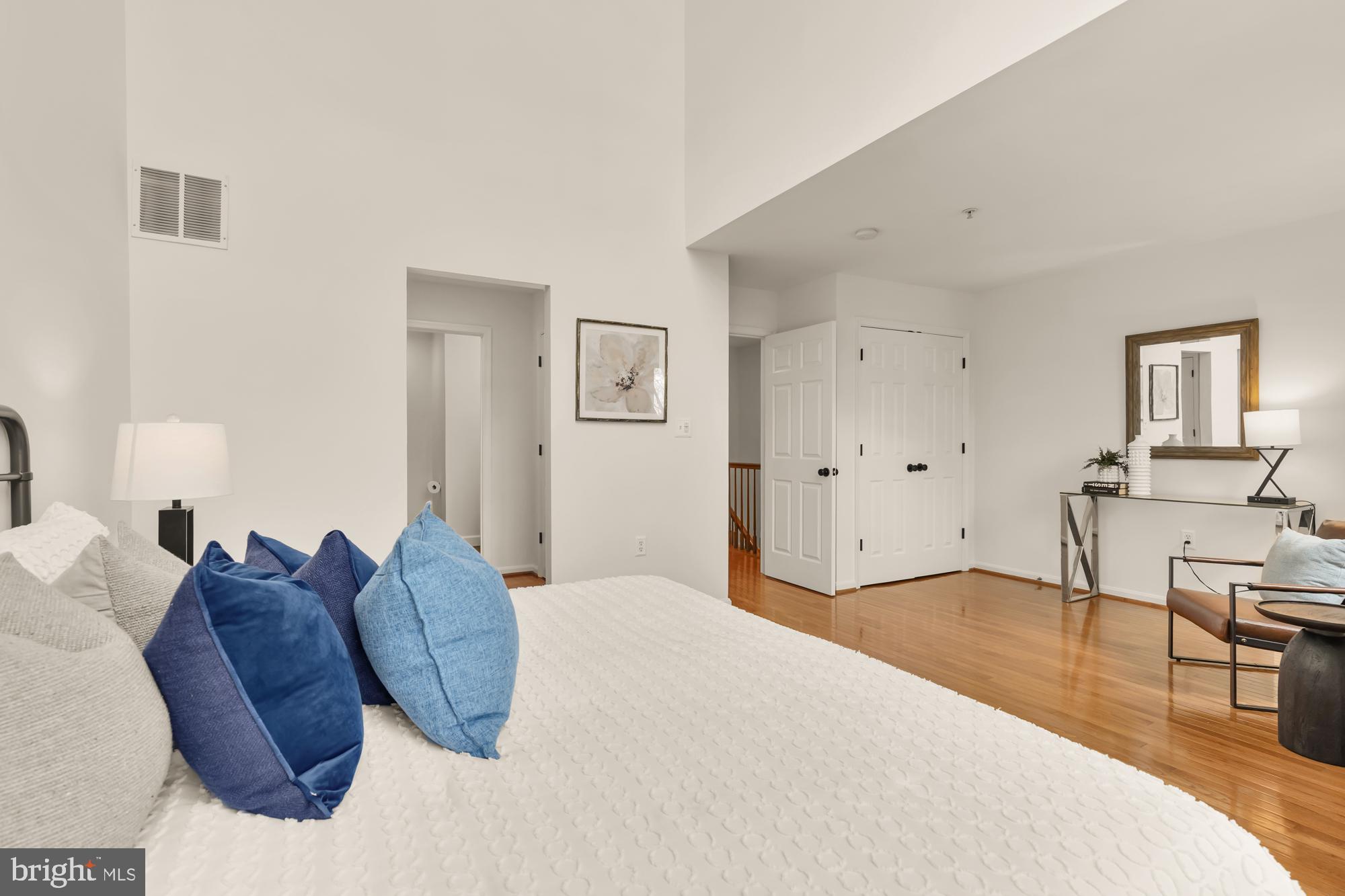 255 14th Street Southeast, Unit A Washington, DC 20003 - Photo 18 of 28 a bed room with a bed and a chair