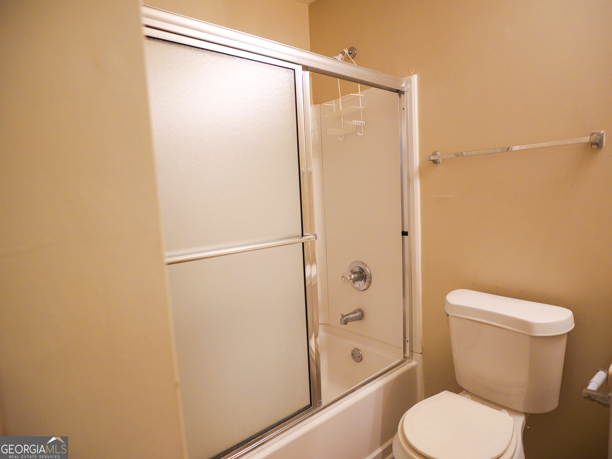 11036 Pebble Ridge Drive Hampton, GA 30228 - Photo 15 of 35 a white toilet sitting next to a shower