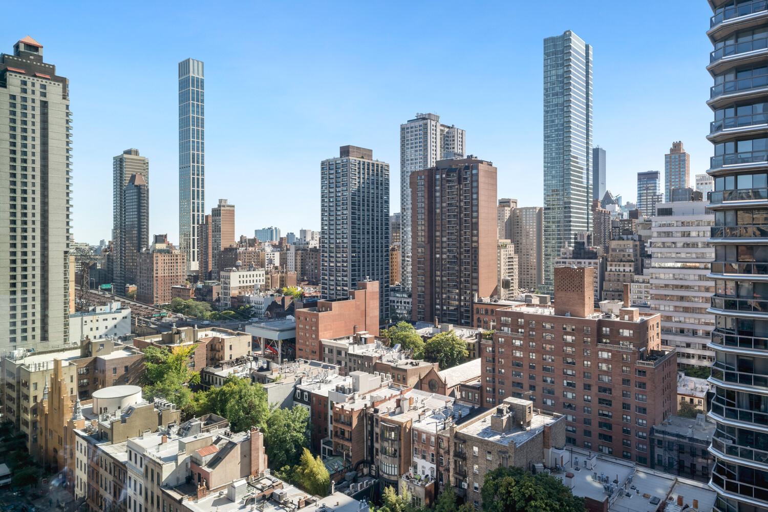200 East 62nd Street, Unit 19D Manhattan, NY 10065 - Photo 13 of 14 a view of city with tall buildings