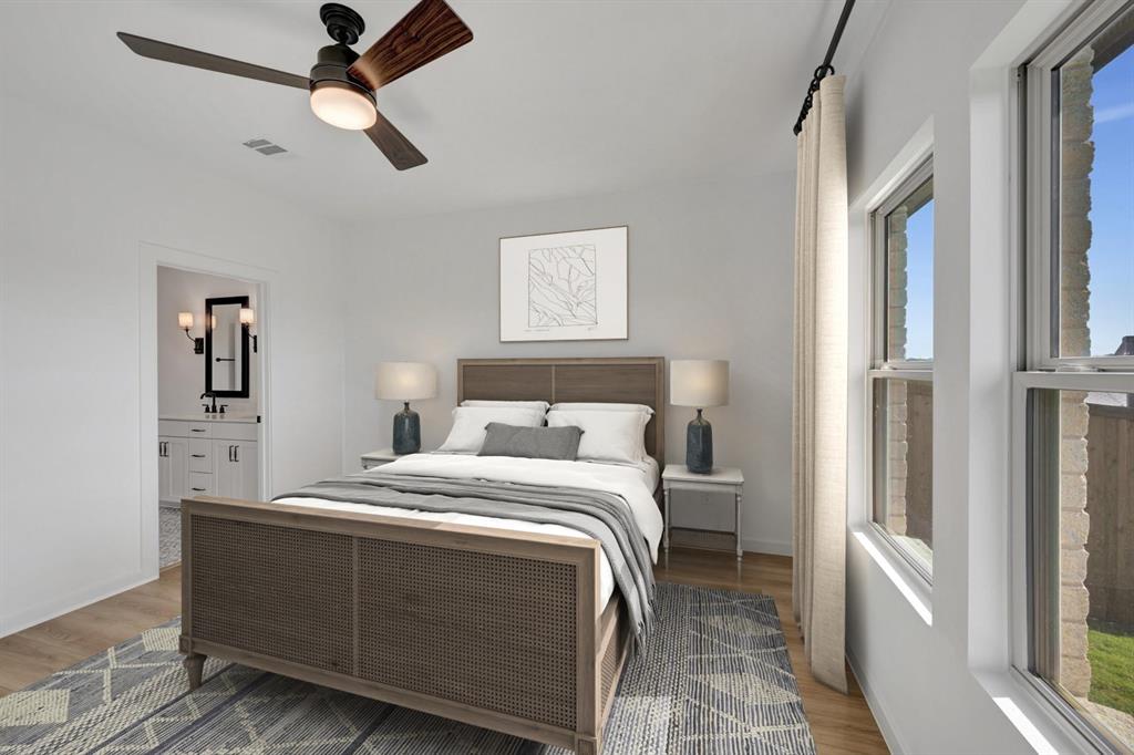 1424 Elliott Road Howe, TX 75459 - Photo 13 of 28 a bedroom with a bed and a window