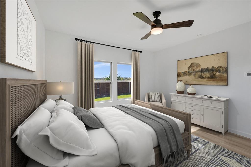 1424 Elliott Road Howe, TX 75459 - Photo 14 of 28 a bedroom with a large bed dresser and a window