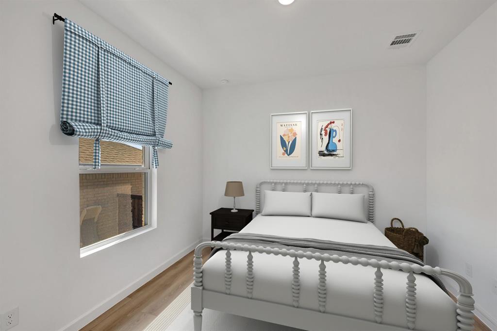 1424 Elliott Road Howe, TX 75459 - Photo 19 of 28 a bedroom with a bed and a window