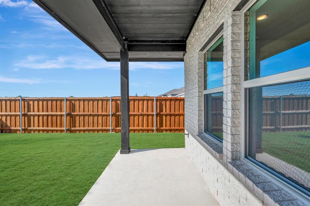 1424 Elliott Road Howe, TX 75459 - Photo 24 of 28 a view of a backyard with a garden
