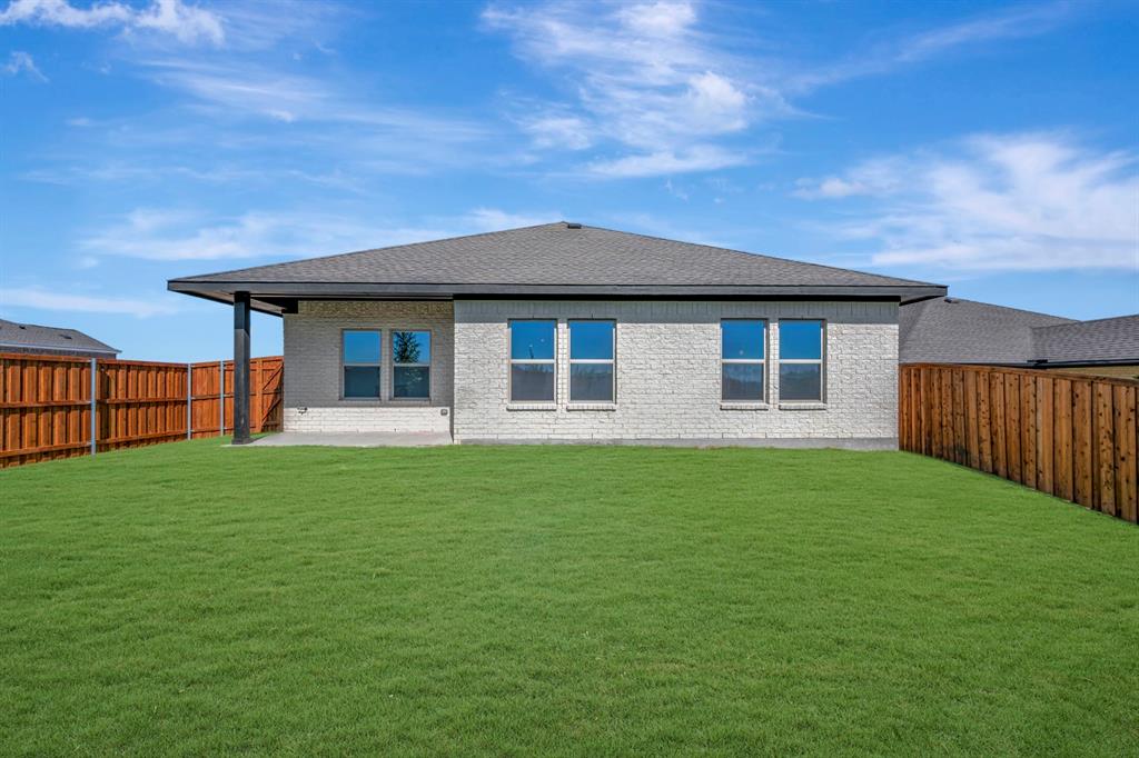 1424 Elliott Road Howe, TX 75459 - Photo 26 of 28 a backyard of a house with lots of green space
