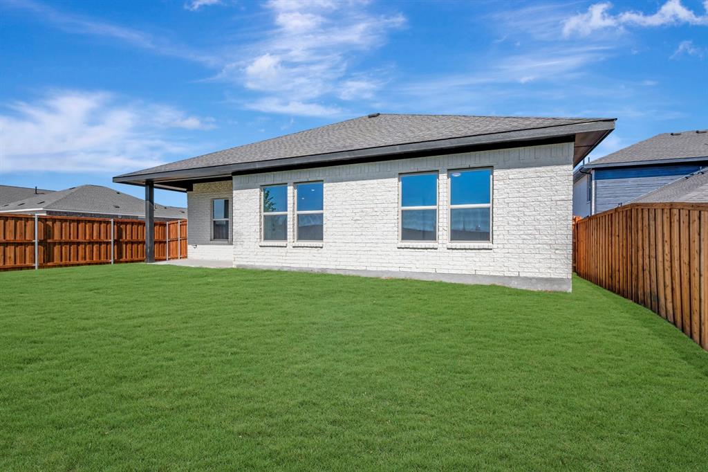 1424 Elliott Road Howe, TX 75459 - Photo 28 of 28 a backyard of a house with lots of green space